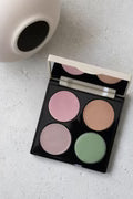 Redness rescue corrective palette with four color correctors.