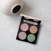 Redness rescue corrective palette with four color correctors.