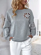 Perfee Cutout Pearl Round Neck Long Sleeve Sweatshirt-Sweaters-Krush Kandy, Women's Online Fashion Boutique Located in Phoenix, Arizona (Scottsdale Area)