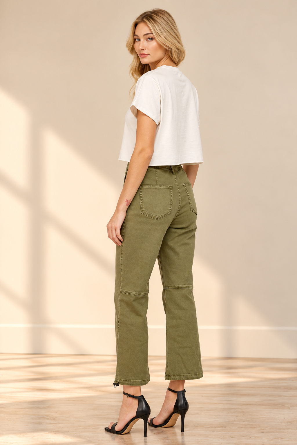 Blonde Woman in Olive Utility Jeans.png