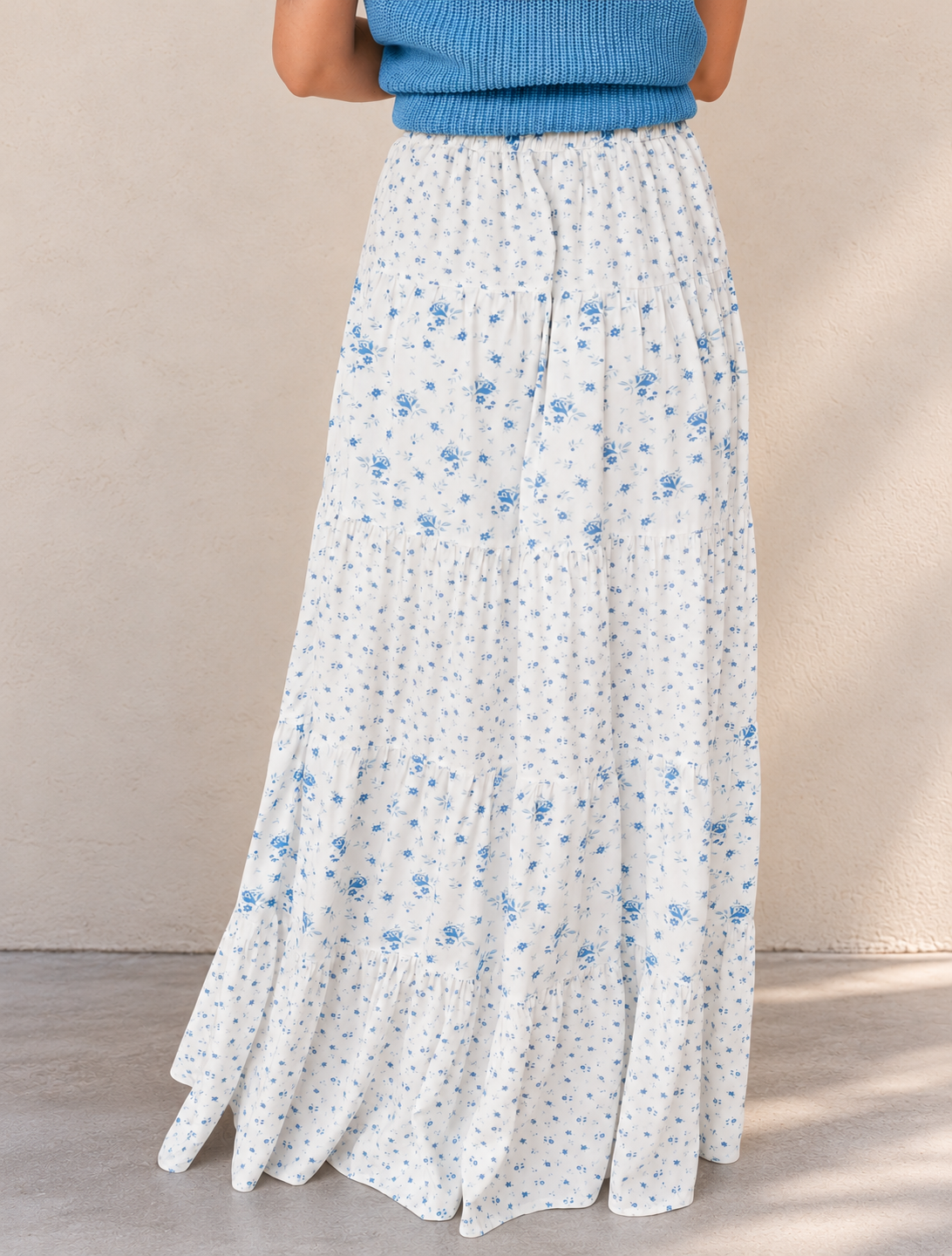 Blue Knit Top and Floral Tiered Skirt.png