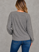 Brunette in Gray Knit and Jeans.png