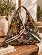 Jungle Print Hobo Bag Still Life.png