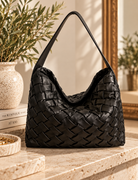 Luxe Woven Leather Bag Still Life.png