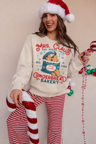 Mrs. Claus Gingerbread Bakery Portrait.png