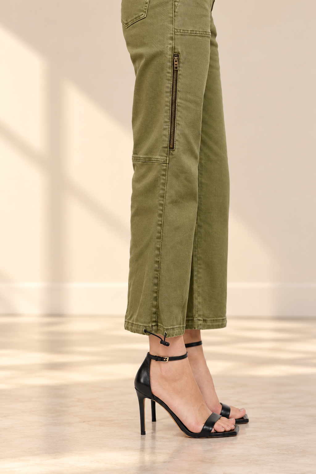 Olive Utility Pants and Black Heels.png
