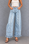 Polka Dot Ruffle-Hem Jeans Studio Look.png