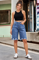 Smiling Street Style in Bermuda Shorts.png