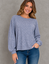 Smiling Woman in Blue Sweater and Jeans.png