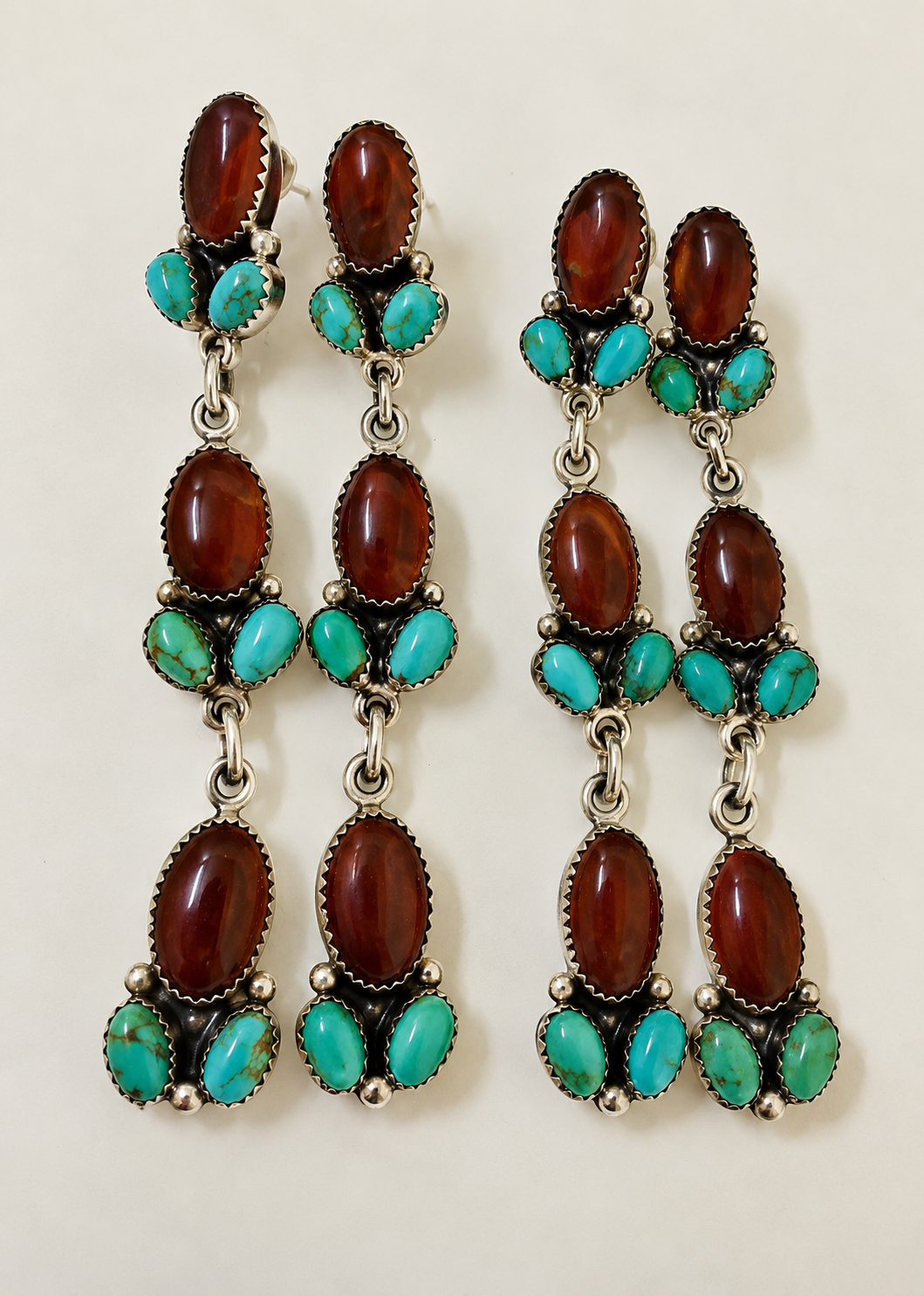 Turquoise and Brown Stone Dangle Earrings.png