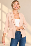 Warm Studio Portrait in Blush Blazer.png