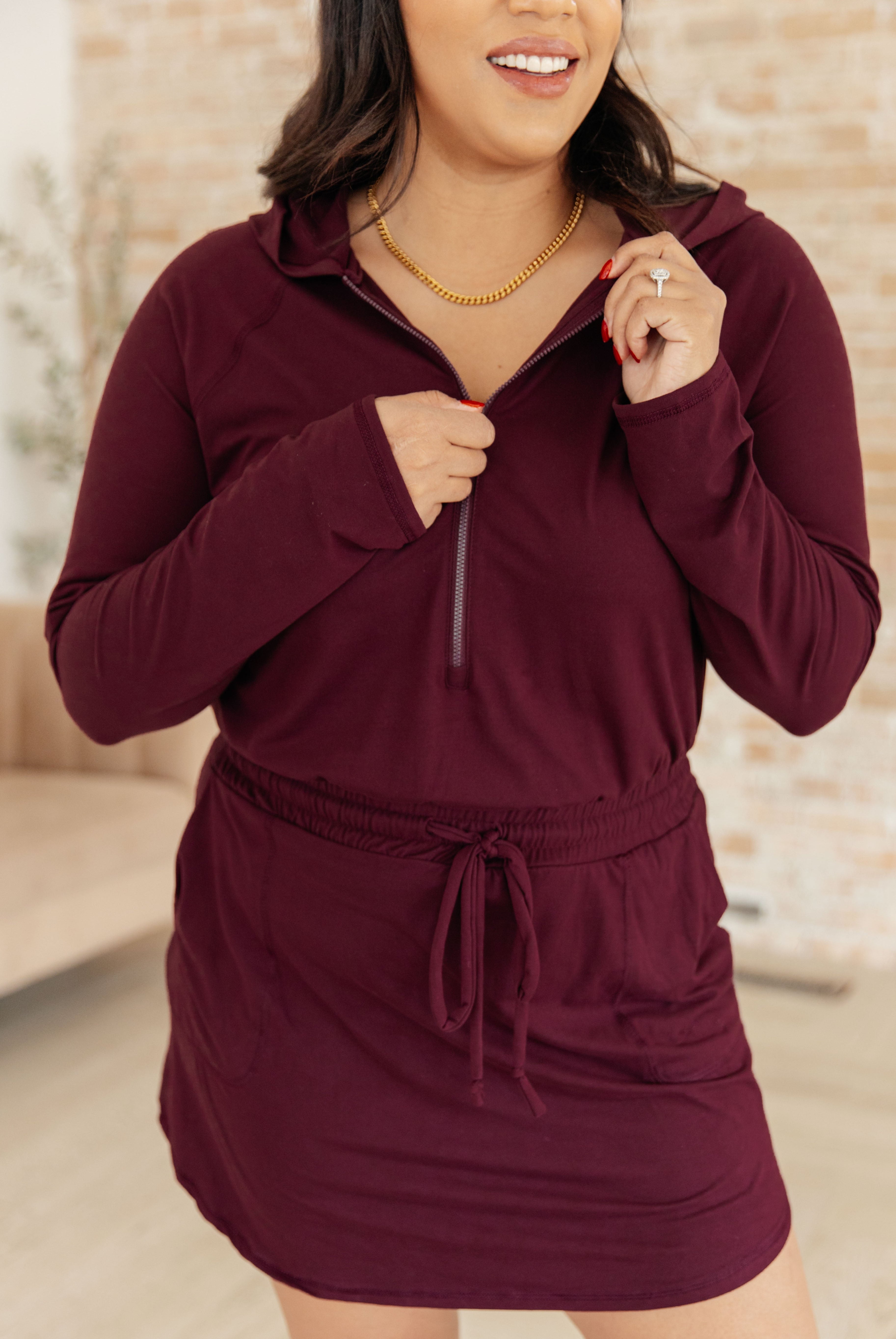 Getting Out Long Sleeve Hoodie Romper in Maroon-Jumpsuits & Rompers-Krush Kandy, Women's Online Fashion Boutique Located in Phoenix, Arizona (Scottsdale Area)